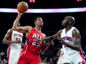 Atlanta Hawks forward Thabo Sefolosha (25) goes to the basket against Detroit Pistons centre Joel Anthony (50) during the fourth quarter at The Palace of Auburn Hills. (Tim Fuller/USA TODAY Sports)