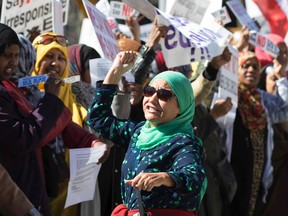 Protesters gather on the lawn at Queen's Park to rally against the government's new sex education curriculum on Tuesday April 14, 2015. Craig Robertson/Toronto Sun