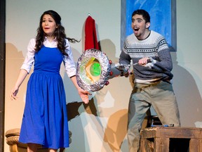 Maurice, played by Abdullah Al Haddad, shows off his working invention to daughter Belle, played by Helen Danial, in the John Paul II Catholic secondary school production of Beauty and the Beast. (CRAIG GLOVER, The London Free Press)