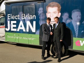 Wildrose Leader Brian Jean and Grande Prairie-Smoky candidate Todd Loewen pose for pictures during a campaign stop in Grande Prairie, Alta. on Monday, April 13. Braeden Jones/Grande Prairie Daily Herald-Tribune/Postmedia Network
