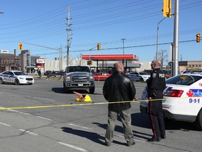 Police and paramedics responded to the scene of an accident between a pickup truck and a cyclist at the corner of Ogilvie Road and City Park Drive, Monday afternoon around 2:30 p.m. The cyclist was taken found unconscious by paramedics and is listed in critical condition on arrival at the hospital. Andrew Meade/ Ottawa Sun/ QMI Agency