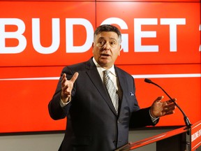 Ontario Finance Minister Charles Sousa announces the budget date of April 23 during a visit to Ryerson University on Tuesday April 14, 2015. (Michael Peake/Toronto Sun)
