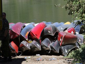 Hundreds of boats are piled up at Gold Bar Park.  Over 300 soldiers participated in Ex Mountain Man 2012 military fitness competition in  Edmonton, Alberta  on August, 30  2012.  The course includes a canoe portage, 31.6 km foot race and a 10km paddle on the North Saskatchewan River.    PERRY MAH/EDMONTON  SUN