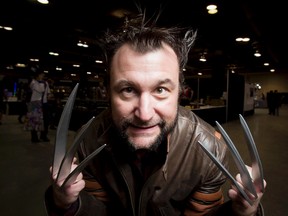 Dale Kliparchuk strikes his Wolverine pose during the closing hour of the Calgary Comic and Entertainment Expo at the BMO Centre in Calgary, Alta., on Sunday, April 27, 2014. The packed weekend event featured celebrities, panel discussions and, of course, tons of costumed fans. Lyle Aspinall/Calgary Sun/QMI Agency
