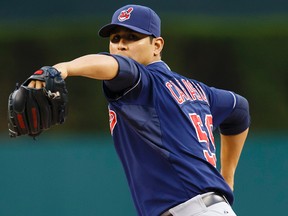 Fille photo of Cleveland Indians starting pitcher Carlos Carrasco (59) pitching in the first inning against the Detroit Tigers at Comerica Park. Rick Osentoski-USA TODAY Sports