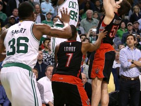 Celtics’ Jae Crowder drains the game-winning basket against the Raptors in Boston last night. The Raptors lost 95-93. (AFP)