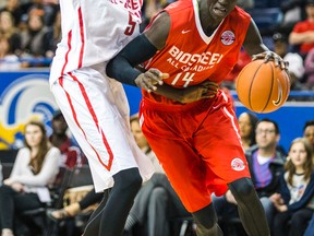 Brothers Matur Maker (left) and Thon Maker (right) go at each other at the BioSteel All-Canadian Basketball Game at the Mattamy Centre last night. Team Red won 99-95. (Ernest Doroszuk/Toronto Sun)