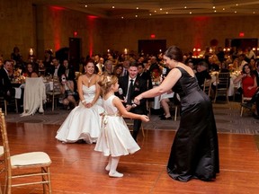 Emma and Melanie during their surprise performance of "Love is an Open Door" (Special to St. Catharines Standard from Gemini Photography)