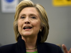 Former U.S. Secretary of State Hillary Clinton talks with reporters as she campaigns for the 2016 Democratic presidential nomination at Kirkwood Community College in Monticello, Iowa on April 14, 2015. (REUTERS/Rick Wilking)
