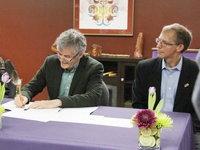 Confederation College President Jim Madder (left) with Trent University President and Vice-Chancellor Dr. Leo Groarke and FNTI President and CEO Derek Sagima during an event Monday, where the school leaders signed a new partnership between the schools. 
Submitted photo.