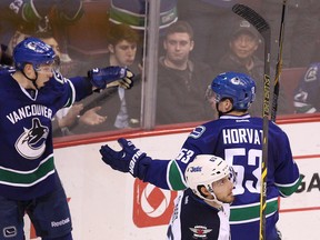 Ronalds Kenins (left) and Bo Horvat (right) are among the few playoff rookies on the Canucks roster. (Carmine Marinelli/Postmedia Network/Files)
