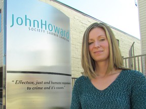 Christine LeDrew, the new executive director of the John Howard Society in Sarnia, stands outside its office on Tuesday April 14, 2015 in Sarnia, Ont. (Paul Morden/Sarnia Observer/ Postmedia Network)