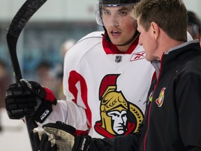 Ottawa Senators Cody Ceci receives instruction from Assistant Coach Mark Reeds during day two of the the Sens Development Camp at the Bell Sensplex. July 4,2013. Errol McGihon/Ottawa Sun/QMI Agency