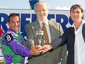 Ivan Dalos in the winner’s circle last year after Ami’s Holiday’s Breeders Stakes victory. (MICHAEL BURNS, photo)