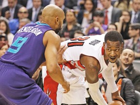Terrence Ross contemplates his next move as he hangs on the ball against the Charlotte Hornets on Wednesday night at the ACC. (JACK BOLAND, Toronto Sun)