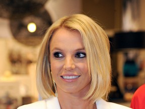 Britney Spears promoting her lingerie line Intimate Collection at CentrO Oberhausen shopping mall on 25 Sept. 2014. (Patrick Hoffmann/WENN.com)