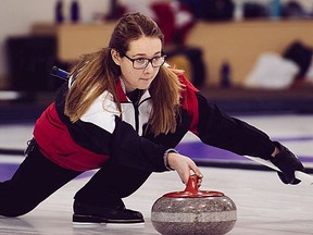 Belleville skip Kayla MacMillan throws a rock during the Optimist U18 International curling championships held recently in Edmonton. (Submitted photo)