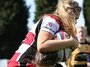 Belleville native Rachelle Malette makes a textbook tackle during the recent All-England national women's Junior Cup rugby final. (Submitted photo)
