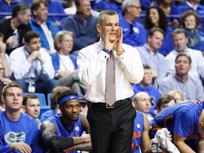Florida Gators head coach Billy Donovan coaches his players during the game against the Kentucky Wildcats in the first half at Rupp Arena. (Mark Zerof/USA TODAY Sports)