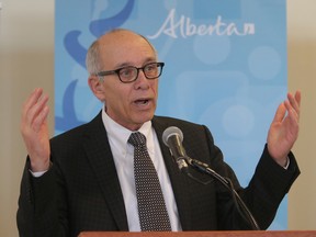 Health Minister Stephen Mandel talks after Alberta Premier Jim Prentice announced a new cancer centre to be built on the grounds of the South Health Campus in SE Calgary, Alta. where they made the announcement on Monday March 30, 2015. The Alberta government has budgeted $3.4 billion for health facilities over the next five years. Stuart Dryden/Calgary Sun
