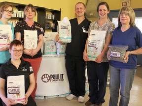 A number of veterinary clinic representatives were on hand at the Inn of the Good Shepherd in Sarnia Thursday to help out with a Pet Pantry event, put on by Associate Veterinary Clinics. The drop-in event was open to Inn clients and offered free pet food and pet advice. Pictured, from left, are Sarah Whittington, Shoshana Verton-Shaw, Eveline Petrie, Kurt Wakem, Jenna DeSchutter, and Catherine Douglass, representing various animal clinics in the Sarnia and London area. (Tyler Kula, The Observer)