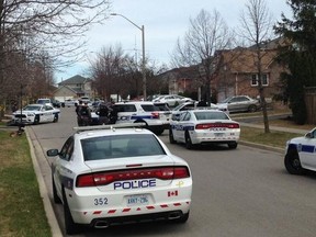 Peel police at the scene on Stillriver Cres. after a double stabbing Thursday, April 16, 2015. (Shawn Jeffords/Toronto Sun)