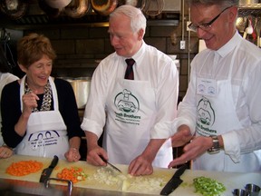 Sharon Johnston, left, and Gov. Gen. David Johnston help prepare some soup for Soup Sisters/Broth Brother. Alexandra Moscato/Ottawa Sun