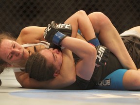 Alexis Davis (left) tries to submit Rosi Sexton during UFC 161 at the MTS Centre in Winnipeg June 15, 2013. (Postmedia Network file photo)