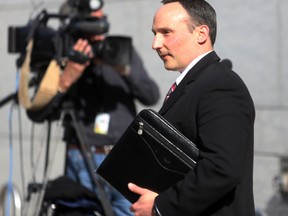 OTTAWA, ONT. (16/04/2015) Mike Croskery, third witness of the day in the Mike Duffy  trial, leaves the Ottawa Courthouse on the Apr. 16, 2015 after day eight of testimony in the trial relating to his Senate expense claims. Andrew Meade/ Ottawa Sun/ Postmedia Network