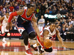 Two of the best guards in the NBA — John Wall (left) and Kyle Lowry — will be falling all over each other in this series. (USA TODAY)