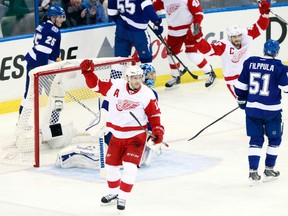 Detroit Red Wings center Pavel Datsyuk celebrates after he scored a goal against the Tampa Bay Lightning during the first period in Game 1 of the first round of the 2015 NHL playoffs at Amalie Arena on April 16, 2015. (Kim Klement/USA TODAY Sports)