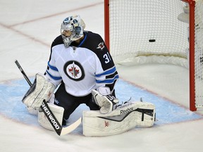 Ondrej Pavelec lets one by against the Ducks in Ahaheim on Thursday. (GARY A. VASQUEZ/USA Today Sports)