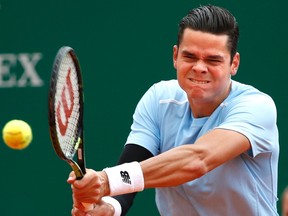 Milos Raonic returns the ball to Tomas Berdych during their quarterfinal match at the Monte Carlo Masters in Monaco on Friday, April 17, 2015. (Eric Gaillard/Reuters)
