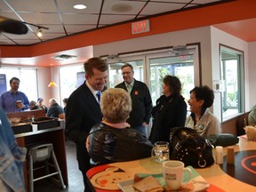 Wildrose Leader Brian Jean (left) and Stony Plain MLA candidate Kathy Rondeau (centre) met with local voters at A&W on April 14. It was the local business’ 21st anniversary. - Thomas Miller, Reporter/Examiner