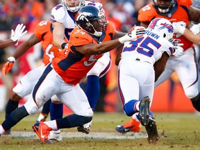 Buffalo Bills running back Bryce Brown is tackled by Denver Broncos linebacker Brandon Marshall. (Isaiah J. Downing/USA TODAY Sports)