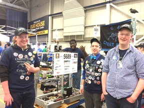 Members of the CK Cyber Pack robotics team pose with their robot at the regional competition at the University of Windsor. The team won the Rookie All-Star Award at the event, which secured their spot in the world championships this week in St. Louis. From left: Matthew Graham, Abeeku Paintsil, Ian Reuten and Ryan Sorenson. (Submitted photo)