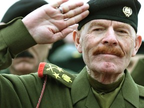 Iraq's vice-Chairman of the Revolution Command Council, Ezzat Ibrahim al-Douri, salutes during a celebration at the Unknown Soldier Monument on Army Day in Baghdad in a January 6, 2002 file photo. Al-Douri, former right-hand man to late Iraqi President Saddam Hussein and a leader of Iraq's Sunni insurgency, has been reported killed by Iraqi forces and Shi'ite militias. Al-Douri was killed in a military operation, Raed al-Jubouri, the governor of Salahuddin province, told Reuters. The pan-Arab television network al-Arabiya showed images of a dead man who looked like al-Douri.  REUTERS/Faleh Kheiber/files