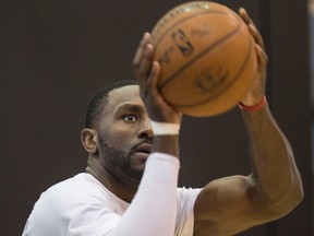 Patrick Patterson works on his shot at practice yesterday. Below, he and John Wall were teammates at Kentucky in 2010. (Craig Robertson/ Toronto Sun)
