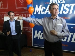 Alberta Premier Jim Prentice (R) meets with PC candidate Bruce McAllister (Chestermere-Rockyview) in Chestermere, Alta, about 20 km east of Calgary, Alta.  on Friday April 17, 2015. McAllister was one of nine Wildrose MLAs who left the Wildrose party and crossed the floor to join the Alberta Progressive Conservative caucus. Jim Wells/Calgary Sun/Postmedia Network