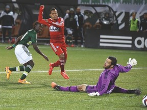 Portland Timbers’ Diego Chara scores a goal past Michael Barrios and goalkeeper Chris Seitz during their game two weeks ago. (AFP)