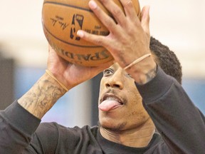 DeMar DeRozan, eyeing a shot at yesterday’s practice, is still troubled by that last-second block by Paul Pierce  (inset) on Kyle Lowry in Game 7 of last year’s opening round.  (CRAIG ROBERTSON, Toronto Sun)