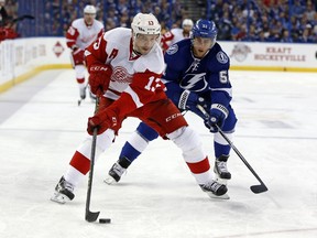 Tampa's Valtteri Filppula chases down former teammate Pavel Datsyuk of the Detroit Red Wings in Game 1 on Thursday. (AFP)