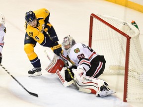 Nashville Predators centre Filip Forsberg scores on Chicago Blackhawks goalie Corey Crawford during Game 2 of the first round of the NHL playoffs at Bridgestone Arena on April 17, 2015. (Christopher Hanewinckel/USA TODAY Sports)