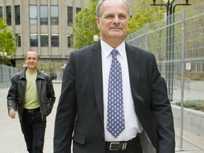 John Schertzer - who was head of the Central Field command drug squad - leaves court at 361 University on Monday April 30, 2012. The defence opened its case for the former members of Central Field command drug squad who are accused of corruption charges. (ERNEST DOROSZUK/Toronto Sun)