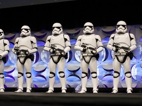 Redesigned stormtroopers appear onstage at the kick-off event of the Star Wars Celebration convention in Anaheim, California, April 16, 2015.  REUTERS/David McNew