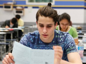 Students participate in a math contest  at William Lyon Mackenzie Collegiate Institute on  April 15, 2015. (Veronica Henri/Toronto Sun)