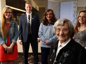 Winners of the annual Volunteer and Information Quinte awards gather at the Travelodge in Belleville Saturday. In the foreground is volunteer of the year Janet DeGroot - who started volunteering in 1942. With her from left are Darcy Reid, Ryan Williams, Elliot Williams and Sarah Day.