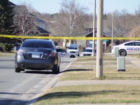Kingston Police gathered on Tanglewood Drive in Kingston, Ont. on Saturday April 18, 2015. Joseph Tessier, special to the Kingston Whig-Standard/Postmedia Network