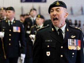 Incoming Commanding Officer Lieutenant-Colonel J.C. Wilson during a Change of Command ceremony for 20th Field Artillery Regiment, Royal Canadian Artillery Regiment, at the Philip L. Debney Armoury, 8403 Roper Road, in Edmonton, Alta. on Saturday April 18, 2014. Wilson takes over from Lieutenant-Colonel D.A. Paquette. David Bloom/Edmonton Sun/Postmedia Network