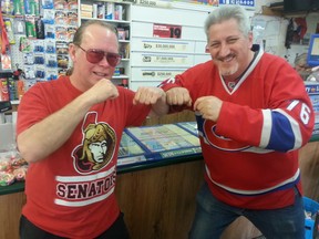 Jacques Lalande, owner of Lalande convenience store, decked out in his P.K. Subban jersey puts up his dukes to customer Norm Irwin, who's a Sens fan on Friday, April 17/2015. Both live in Vankleek Hill, a small Ontario town directly in between Montreal and Ottawa. (Keaton Robbins/Ottawa Sun/Postmedia Network)